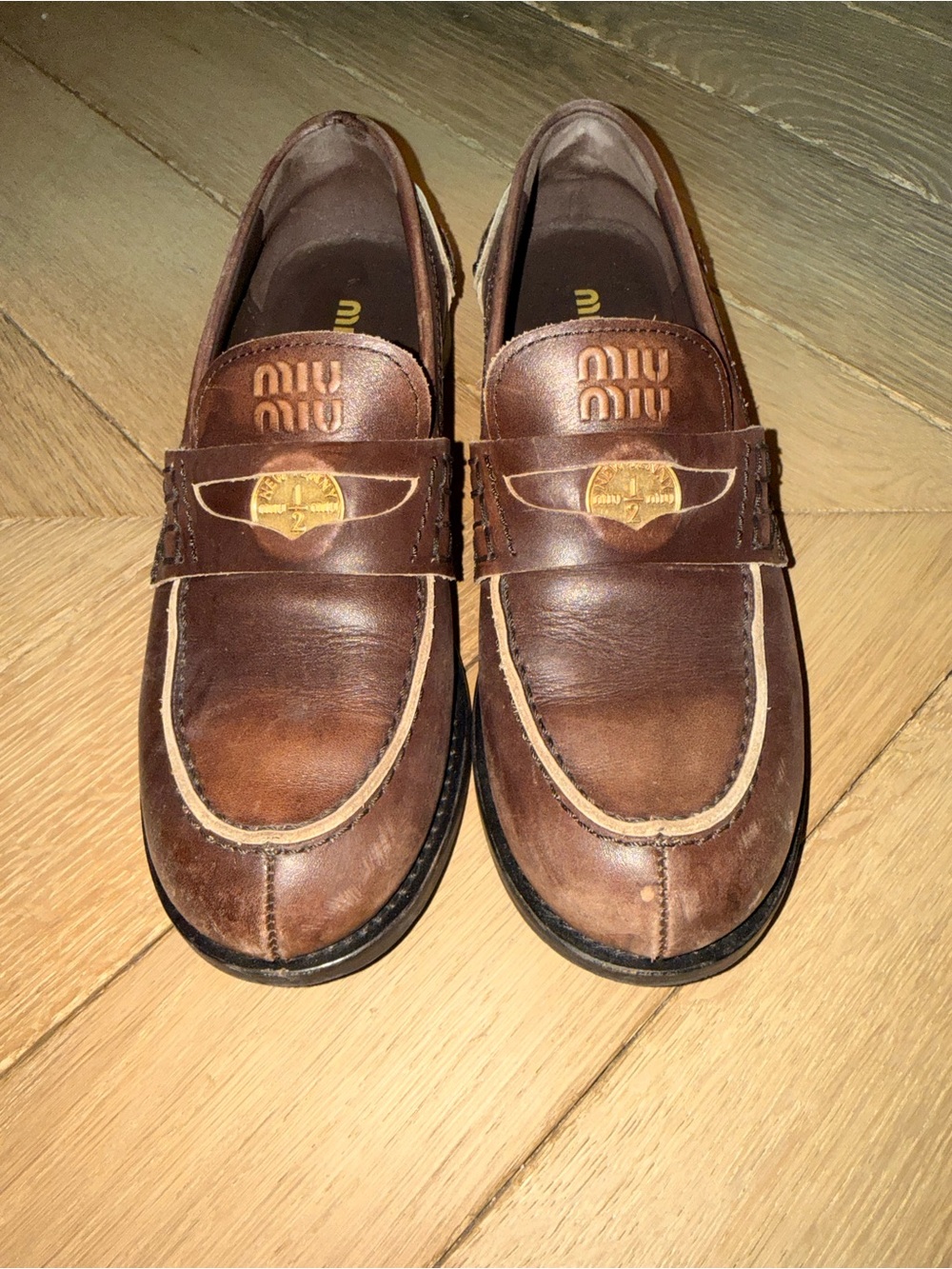 Miu Miu Brown Leather Penny Loafers with Gold Accent
